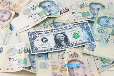 US Dollar And Singapore Bank Notes Stock Photo