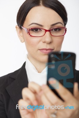 Usinesswoman Using Mobile Phone Stock Photo