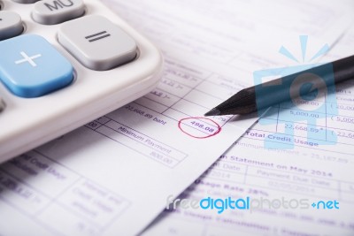 Utility Bill With Calculator And Pencil Stock Photo