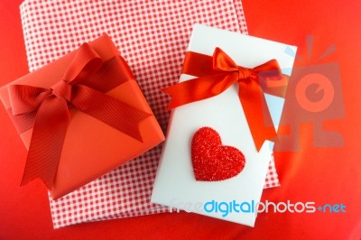 Valentines Gift Box With A Red Bow On Red Background Image Of Va… Stock Photo