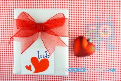 Valentines Gift Box With A Red Bow On Red Background Image Of Va… Stock Photo