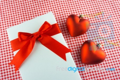 Valentines Gift Box With A Red Bow On Red Background Image Of Va… Stock Photo