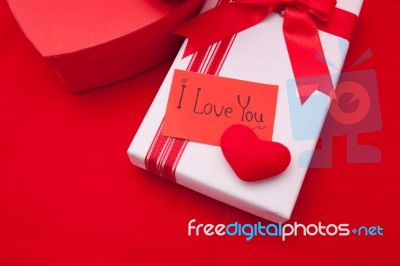 Valentines Gift Box With A Red Bow On Red Background Image Of Va… Stock Photo