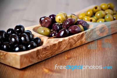 Variety Of Green, Black And Mixed Marinated Olives Stock Photo