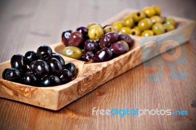 Variety Of Green, Black And Mixed Marinated Olives Stock Photo