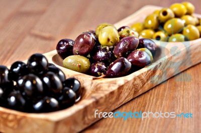 Variety Of Green, Black And Mixed Marinated Olives Stock Photo