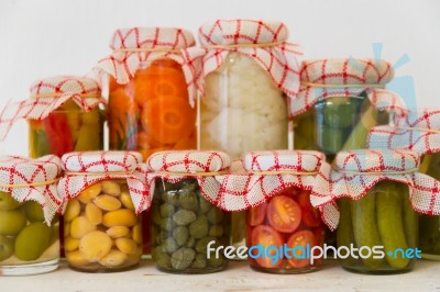 Variety Of Jars With Organic Vegetable Pickles Stock Photo