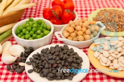 Variety Of Kitchen Ingredients With Fresh And Dried Legumes Stock Photo