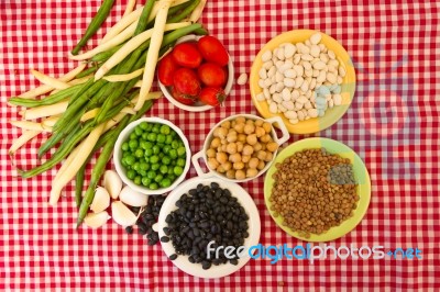 Variety Of Kitchen Ingredients With Fresh And Dried Legumes Stock Photo