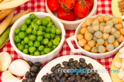 Variety Of Kitchen Ingredients With Fresh And Dried Legumes Stock Photo