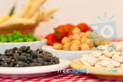 Variety Of Kitchen Ingredients With Fresh And Dried Legumes Stock Photo