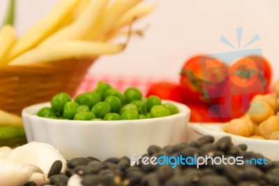 Variety Of Kitchen Ingredients With Fresh And Dried Legumes Stock Photo