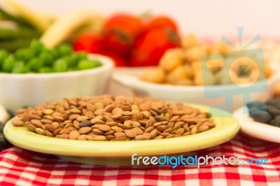 Variety Of Kitchen Ingredients With Fresh And Dried Legumes Stock Photo