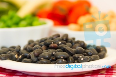 Variety Of Kitchen Ingredients With Fresh And Dried Legumes Stock Photo