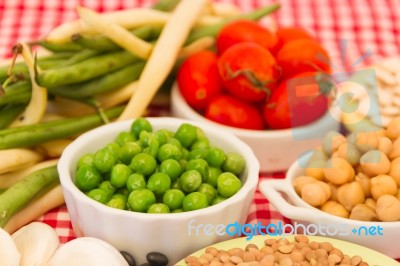 Variety Of Kitchen Ingredients With Fresh And Dried Legumes Stock Photo