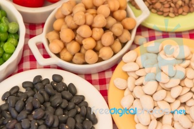 Variety Of Kitchen Ingredients With Fresh And Dried Legumes Stock Photo