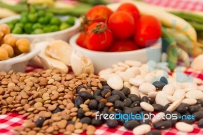 Variety Of Kitchen Ingredients With Fresh And Dried Legumes Stock Photo