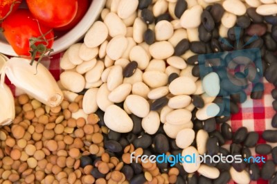 Variety Of Kitchen Ingredients With Fresh And Dried Legumes Stock Photo