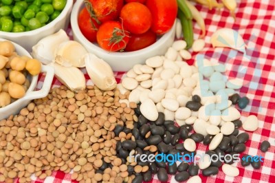 Variety Of Kitchen Ingredients With Fresh And Dried Legumes Stock Photo