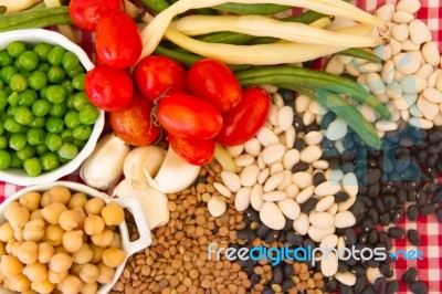 Variety Of Kitchen Ingredients With Fresh And Dried Legumes Stock Photo