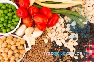 Variety Of Kitchen Ingredients With Fresh And Dried Legumes Stock Photo