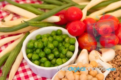 Variety Of Kitchen Ingredients With Fresh And Dried Legumes Stock Photo