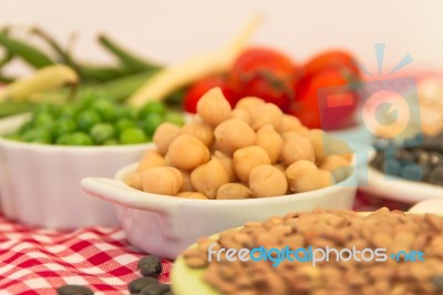 Variety Of Kitchen Ingredients With Fresh And Dried Legumes Stock Photo