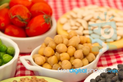 Variety Of Kitchen Ingredients With Fresh And Dried Legumes Stock Photo