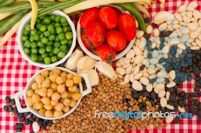 Variety Of Kitchen Ingredients With Fresh And Dried Legumes Stock Photo