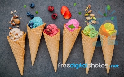 Various Of Ice Cream Flavor In Cones Blueberry ,strawberry ,pist… Stock Photo