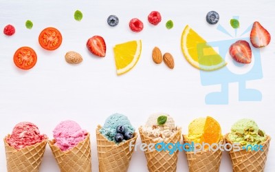 Various Of Ice Cream Flavor In Cones Blueberry ,strawberry ,pist… Stock Photo