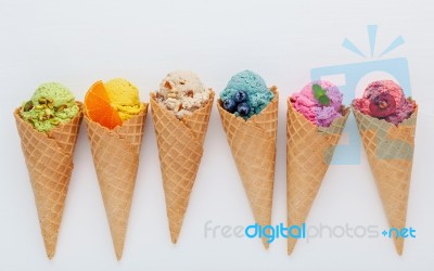 Various Of Ice Cream Flavor In Cones Blueberry ,strawberry ,pist… Stock Photo