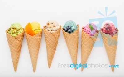 Various Of Ice Cream Flavor In Cones Blueberry ,strawberry ,pist… Stock Photo