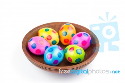 Various Painted Chicken Easter Eggs In Wooden Bowl On White Stock Photo