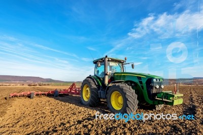 Varna, Bulgaria - March 5, 2017 Ploughing A Field With John Deer… Stock Photo