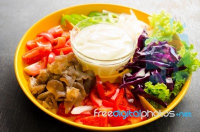 Vegetable Salad In Orange Bowl Stock Photo