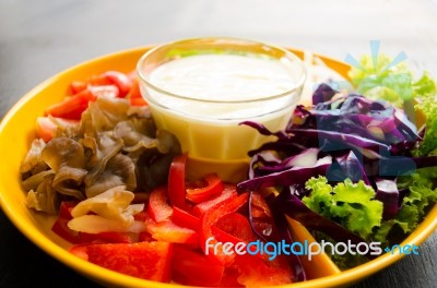 Vegetable Salad In Orange Bowl Stock Photo