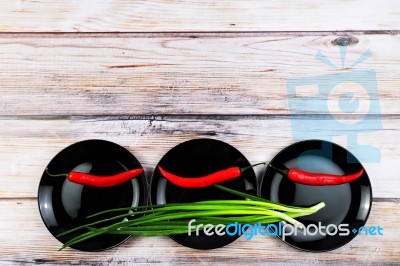 Vegetables In Plates Over Wooden Background Stock Photo