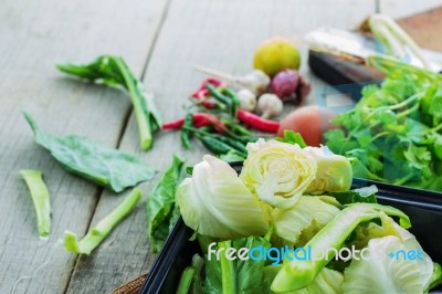 Vegetables On Wooden Floor Stock Photo