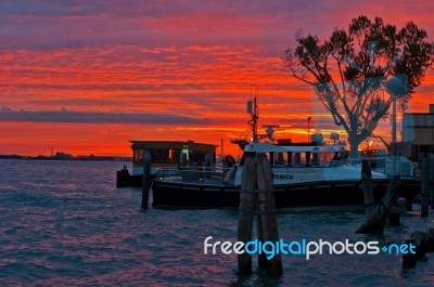 Venice Italy Sunset With Cruise Boat Stock Photo