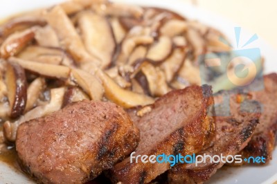 Venison Deer Game Filet And Wild Mushrooms Stock Photo