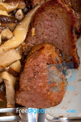 Venison Deer Game Filet And Wild Mushrooms Stock Photo