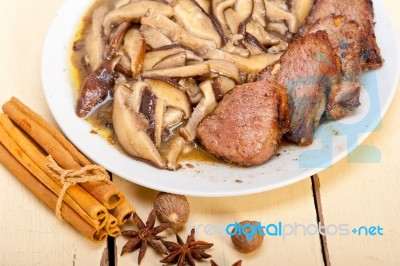 Venison Deer Game Filet And Wild Mushrooms Stock Photo