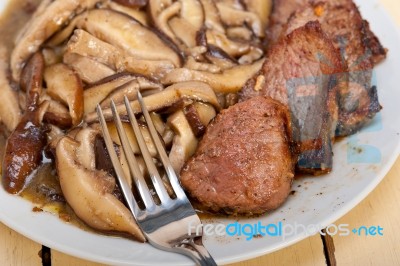 Venison Deer Game Filet And Wild Mushrooms Stock Photo