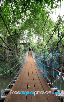 Vertical Wooden Suspension Bridge Cross Small River To House Stock Photo