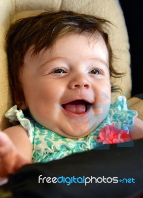 Very Happy Infant In Carseat Stock Photo