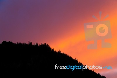 Vibrant Sunset Cloud Formation Stock Photo