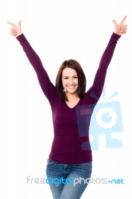 Victorious Young Woman Celebrating Her Success Stock Photo