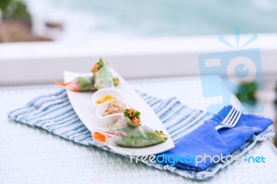 Vietnamese Spring Rolls With Vegetables And Coriander On A Plate… Stock Photo