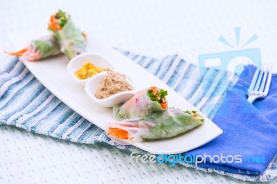 Vietnamese Spring Rolls With Vegetables And Coriander On A Plate… Stock Photo